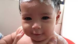 Cute baby girl's massive hair gets mistaken for a wig and she's stopped in  street for selfies