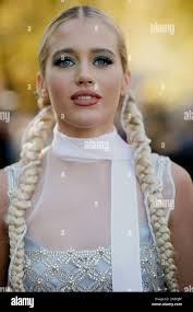 Street style, Olivia Neill arriving at Miu Miu Spring Summer 2023 show,  held at Palais d Iena, Paris, France,