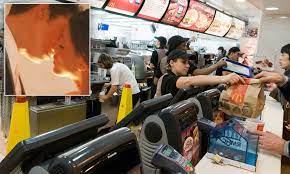 Mcdonald S Cash Register Damaged By A Couple Furiously Making Out Daily Mail Online