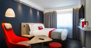 You can easily choose from different types of rooms: Holiday Inn Express Unveils Its Next Generation Guest Experience For Europe Hospitality Interiors Magazine