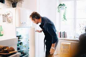 Hanging the hot paid off the fridge is not a good idea if it drops on the stove you could have a fire. Increase The Efficiency Of Your Refrigerator