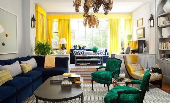 Blue Sofa In Front Of Yellow Curtains Design Ideas