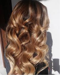 L Oeil Du Tigre La Coloration Qui Fait Litteralement Fondre La Toile En 2020 Produits Capillaires Idees De Coiffures Cheveux Beaute