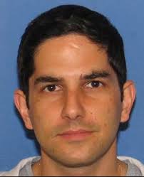 Omar GRAY, A Red Notice has been issued by Interpol for your arrest. You  are currently wanted in United States of America, having been charged with;  “First degree murder, Conspiracy to commit