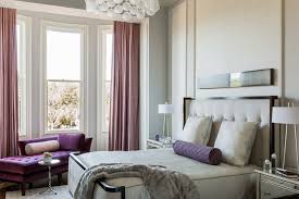 A close up look at this primary bedroom's modish bed setup with a purple accent. Purple Grey Bedroom Houzz