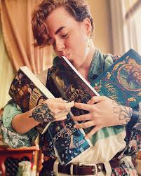 ✨😘📚 Me kissing each one of my special godchildren, the four novels I've  been honored to give covers to. At last, I've gotten my hands