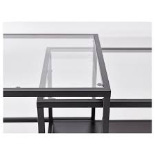 This rustic coffee table of metal and solid wood has a separate shelf for e.g. Vittsjo Black Brown Glass Nest Of Tables Set Of 2 90x50 Cm Ikea