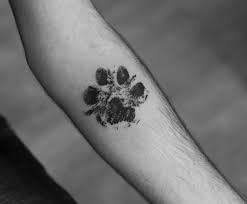 Dog paw tattoo designs and ideas dog paw print tattoos on wrist. 32 Perfect Paw Print Tattoos To Immortalize Your Furry Friend Tattooblend