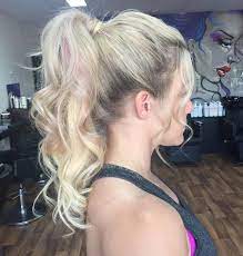 30 Eye Catching Ways To Style Curly And Wavy Ponytails Curly Hair Ponytail High Ponytail Hairstyles Messy Ponytail Hairstyles