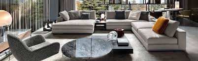 This coffee table with star veneer top and brushed stainless steel base is available in walnut with cognac finish or oak with espresso finish. Minotti London Products