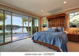 I'm so excited for where this room is headed and can't wait to get to the decorating it! Master Bedroom Interior Glass Wall Opened Stock Photo Edit Now 513783277