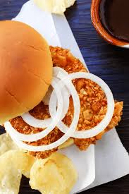 Crispy Pork Tenderloin Sandwiches Deliciously Crispy On The Outside Tender And Juicy In The Pork Tenderloin Sandwich Breaded Pork Tenderloin Sandwich Recipes