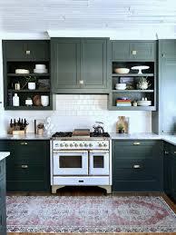 Beadboard panels and a vintage green distinguish the fridge unit. Quick And Fun Vintage Kitchen Tour Town Country Living