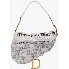 Indeed, the saddle bag is a bag that is worn in exactly the same way as a shirt or jacket, and it's so comfortable to wear with its long strap that you almost forget its there. Pre Owned Christian Dior Newspaper Leather Ghw Saddle Bag 790 Liked On Polyvore Featuring Bags Handbags Shou Dior Saddle Bag Cloth Bags Bags Designer