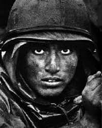 The thousand-yard stare or two-thousand-yard stare is a phrase often used  to describe the blank, unfocused gaze of combatants who have become  emotionally detached from the horrors around them. It is also