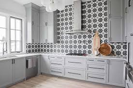 Farmhouse kitchen cabinets shaker kitchen modern farmhouse kitchens kitchen cabinet meet the greige paint color that's taking kitchen cabinets and our pinterest feed by storm. Steel Gray Cabinets With White Black Gray Tiles Transitional Kitchen