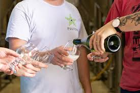 18 Brewers And Distillers Are In Cahoots For Collaborative Block Party On August 5