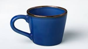 Coffee cup and smartphone on desk. Coffee Mugs That Need To Be On Your Office Table Ellementry