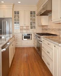 If you love the look of our classic cream kitchen, don't skip this post about our. Love Cream Colored Cabinets Taupe Kitchen Cabinets Kitchen Design Oak Floor Kitchen Cream Kitchen Cabinets