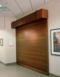 Image Result For Top Roll Interior Door Roll Up Doors Doors Interior Garage Door Rollers