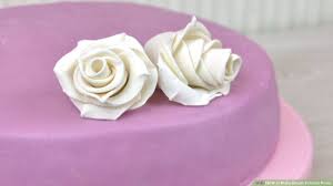 To make a rose, you need to prepare a pastry bag and create a center for the flower, then pipe on petals from the inside out. How To Make Simple Fondant Roses 8 Steps With Pictures