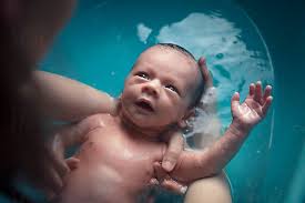 Sprinkle their head with warm water and squeeze on a drop or two of soap. Newborn Baby Boy Taking A Bath With His Mother By Ivan Bastien Photographe