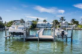 Our experienced lift technicians service and repair all makes and models of boat lifts. Florida Marine Construction Inc Naples Seawall Repair Construction Specialists