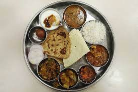 La cucina indiana non è costituita semplicemente da specialità. Thali Il Piatto Unico Per Eccellenza Della Cucina Indiana