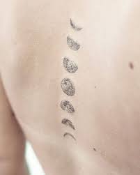 Moon Phases Tattoo On The Spine Tattoogrid Net