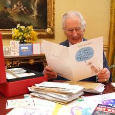 King Charles pictured laughing after ...