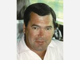 John Dimmick enjoyed the races, fishing, snowmobiling, and boating