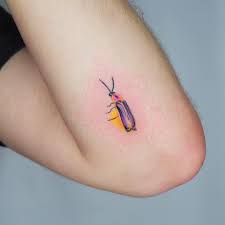 Beetle tattoo bug tattoo flying tattoo body art tattoos sleeve tattoos cool tattoos tatoos firefly tattoo flower photos of rose tattoos with info about the tattoo artists i like the lightning bug but definitely. My Glowbutt By Hannah Kang Nice Tattoo In Brooklyn Ny Tattoos