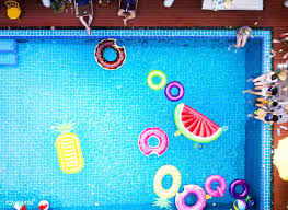 Aerial View Of People Enjoying The Pool With Colorful Inflatable Floats Free Image By Rawpixel Com Flamingo Pool Float Stock Images Free Aerial View