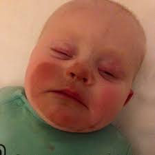 The Reason Why The Baby In This Photo Looks Like This Has Got The Internet Shaking Its Head Spray Tan While Pregnant Breastfeeding Spray Tanning