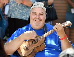 Torrance surrenders in the romance and charm of the ukulele