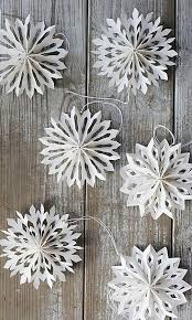 Nine Ways To Take Paper Snowflakes To The Next Level Diy Christmas Snowflakes Christmas Diy Christmas Snowflakes