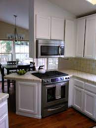 Oak Cabinets Painted White With Km Epoxy Paint Kitchen Aid Convection Slide In Range And 400cfm Microwave Convection C Painting Cabinets Oak Cabinets Kitchen