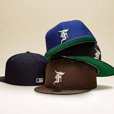 Fear Of God Essentials X New Era Caps Em Tons Classicos Para Usar Sempre Contracoutura