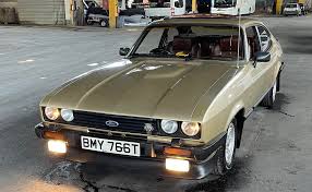 Image result for Gold 1980 Capri