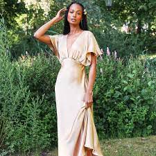 This pretty blush midi made our list of the best summer wedding guest dresses because of its scoop neck, spaghetti straps, and a floral jacquard pattern. 18 Best Colorful Wedding Dresses Of 2021