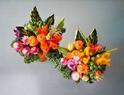 We source only the best fresh flowers on a daily basis and also arrange gift baskets, living plants etc. Carve It Fruit Art Edible Fruit Bouquet Arrangements Fruit Carving Art Display
