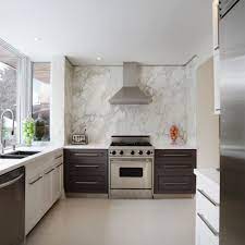 Wondering where to end your backsplash? 7 Inspiring Solid Kitchen Backsplashes