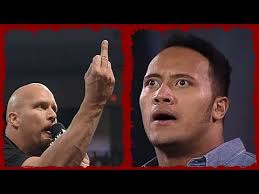 Stone Cold Gives The Rock A Bird For Thanksgiving.