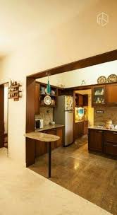 All these features could cramp a poorly planned space, but the kitchen maintains a fresh, open feel. Trendy Kitchen Accessories Decor Tips Ideas Indian Interior Design Kitchen Design Open Kitchen Accessories Decor