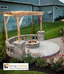 Concrete patio with fire pit. Stamped Concrete Upgrades For Beautiful Backyard Living Springs Concrete