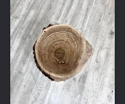 Modern round live edge coffee table with glowing turquoise pigment and walnut wooden legs in triangle shape you can configure your own table, bench and coffee table with our table. Oak Trunk Coffee Table