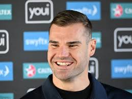 Lions defender Payne signs for another five years