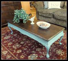 New industrial vintage rustic timber coffee table with wheels. Blue Mahogany Coffee Table Rescued From The Curb Rebuilt On Leg Refinished Painted And She S Brand New Rustic Coffee Tables Coffee Table Ottoman Table