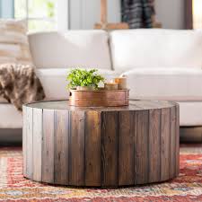 Wagon wheel coffee table with wood hub and iron band, base from horse drawn disk. Wayfair Casters Round Coffee Tables You Ll Love In 2021