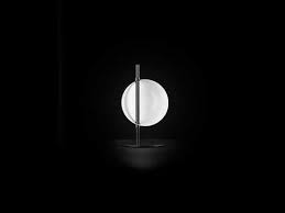 Designed by victor vasilev for oluce is available at switch victor vaislev's superluna lamp fabulously distills aspects of the lighting designs of. Oluce Superluna Black 11 Wide Table Lamp Oe297bl
